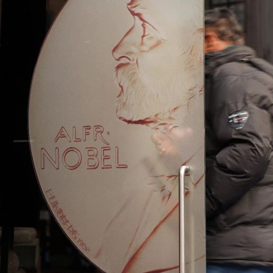 Which global challenges are the focus of this year's Nobel Prize winners?