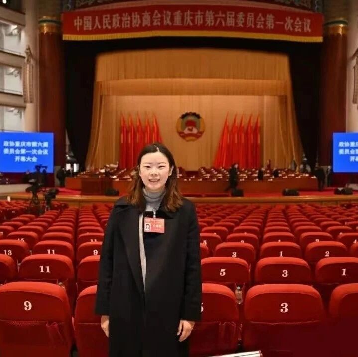 Former Olympic champion debuts in new role, drawing attention with her towering height.