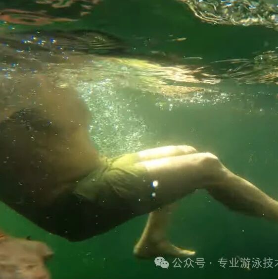 The mental preparation for venturing into deep waters—swimming is a journey of both body and mind.